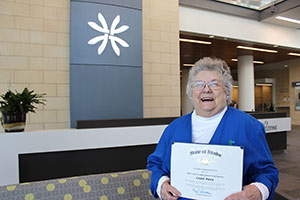 Auxiliary volunteer awarded Brightest Star certificate