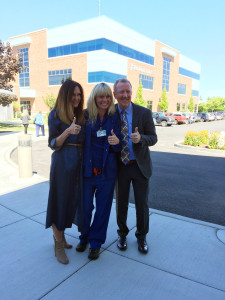 Greg and his wife Laura pose for a photo with his intensive care nurse, Chauntae Peterson.
